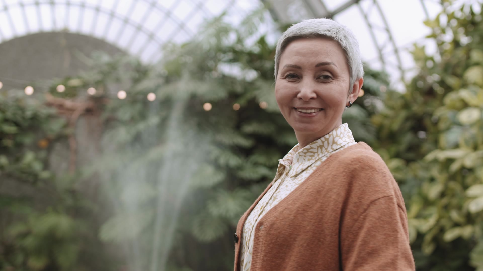 Illustrative portrait of a woman smiling in a garden